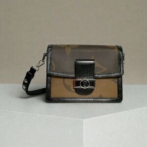 LOUIS VUITTON
Monogram Reverse Giant Canvas And Leather MM Dauphine Bag